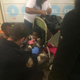 Tabrina Ferrell being checked on by officers after she fell onto the tracks.
Facebook